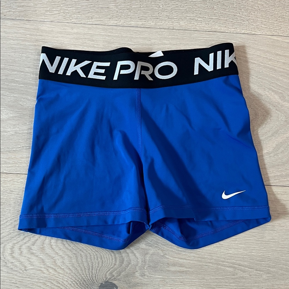 Blue Nike spandex shorts